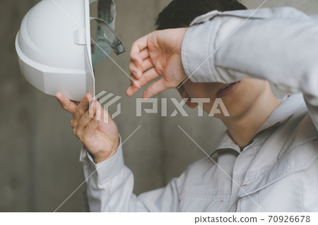 Exhausted worker 70926678