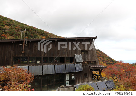 Kurogane hut on Mt. Adatara in Fukushima prefecture during the peak season of autumn leaves Kurogane hut on Mt. Adatara in Fukushima prefecture during the peak season of autumn leaves 70926841
