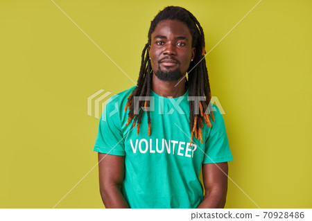 portrait of confident young afro man engaged in volunteering portrait of confident young afro man engaged in volunteering 70928486