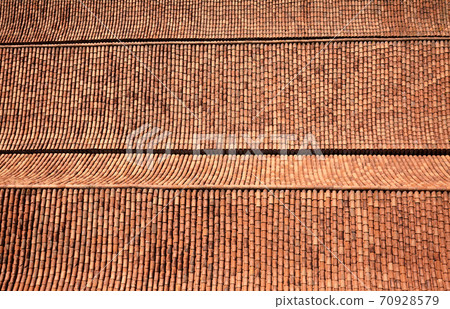 Old clay tile roof background or texture. Old clay tile roof background or texture. 70928579