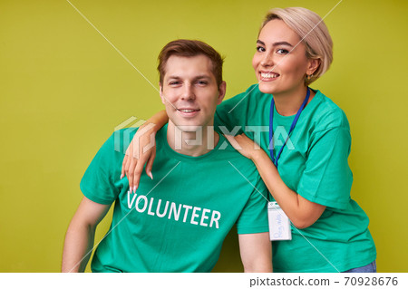 friendly man and woman keen on charity friendly man and woman keen on charity 70928676