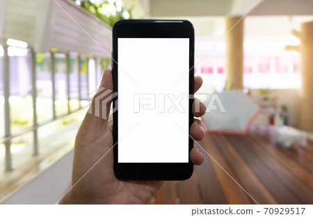 Asian man using hand hold black smartphone, Smartphone mockup background Asian man using hand hold black smartphone, Smartphone mockup background 70929517