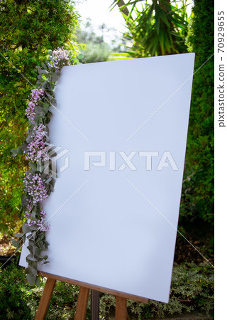 Canvas at an outdoors wedding decoration Canvas at an outdoors wedding decoration 70929655