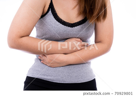Woman suffering from stomach pain and injury isolated white background. Woman suffering from stomach pain and injury isolated white background. 70929801