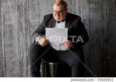 businessman with analysis chart showing current position on oil industry businessman with analysis chart showing current position on oil industry 70929851