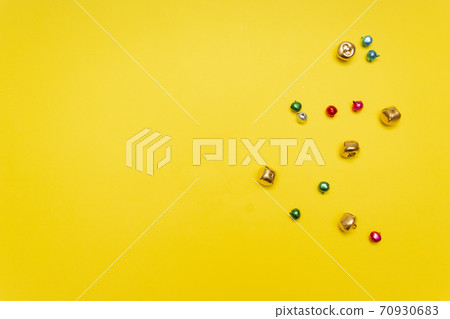 Christmas bells on yellow background, celebration design Christmas bells on yellow background, celebration design 70930683