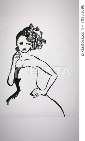 A confident woman wearing a dress and posing A confident woman wearing a dress and posing 70931096