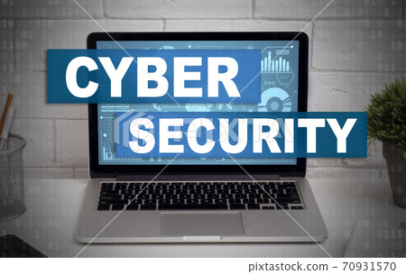 Laptop on office table with abstract digital symbols or hologram and inscription cybersecurity on screen Laptop on office table with abstract digital symbols or hologram and inscription cybersecurity on screen 70931570