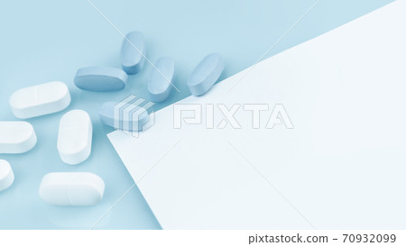 Several white and blue tablets or pills on the table. Medicine and pharmacy Several white and blue tablets or pills on the table. Medicine and pharmacy 70932099