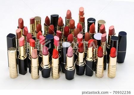 cosmetic lipstick, open tubes on a white background. 70932236
