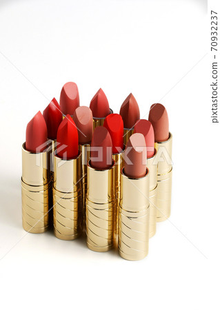 cosmetic lipstick, opened tubes on a white background. 70932237