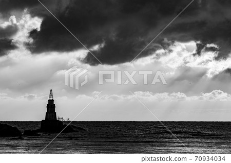 Sunrise at Ahtopol lighthouse in Bulgaria 70934034