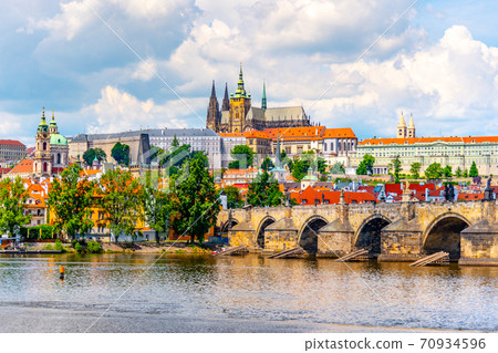 Prague Panorama with Prague Castle and Charles Bridge above Vltava River, Prague, Czech Republic Prague Panorama with Prague Castle and Charles Bridge above Vltava River, Prague, Czech Republic 70934596