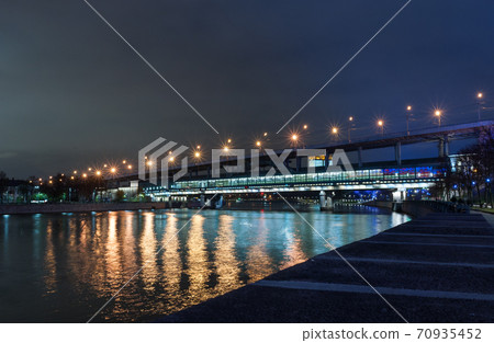 Luzhniki Metro Bridge across the Moskva River in the Vorobyovy Gory night. Luzhniki Metro Bridge across the Moskva River in the Vorobyovy Gory night. 70935452