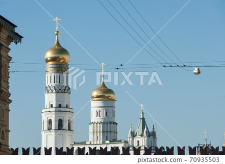The bell tower of Ivan the Great in the Moscow Kremlin. The bell tower of Ivan the Great in the Moscow Kremlin. 70935503