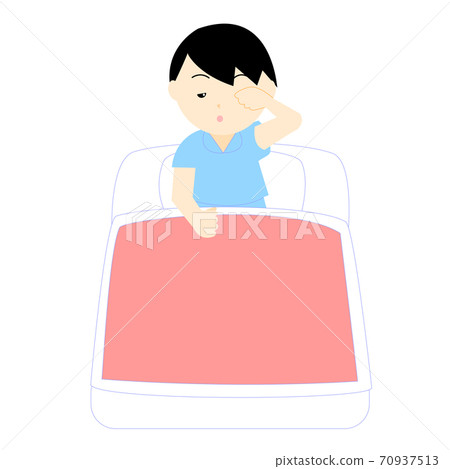 A boy who wakes up while rubbing his sleepy eyes 70937513