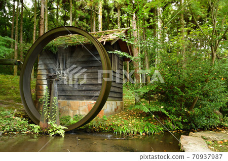 Expo'70 Commemorative Park Natural and Cultural Gardens Satoyama-like water wheel teahouse 70937987