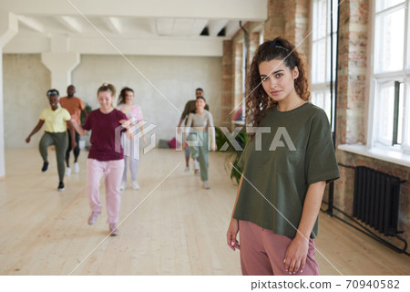 Woman at sports training Woman at sports training 70940582