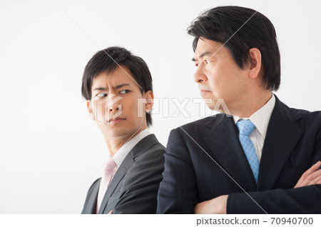 Boss and subordinates staring with scary faces 70940700