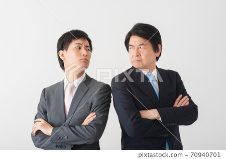 Boss and subordinates quarreling and glaring at each other 70940701