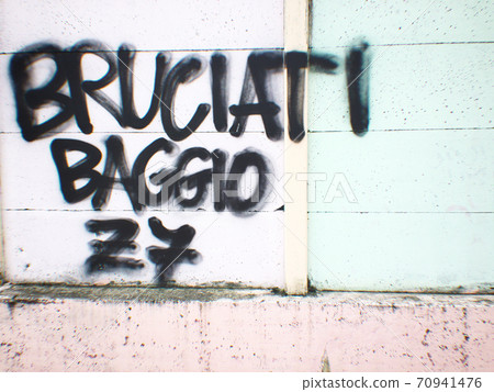 Painted wall in the street, graffiti in Baggio, Milan, Italy, 2019 70941476