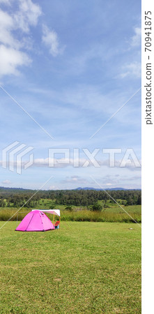 The Campground small Tent and Travel Trailer in the Background. Outdoor Lifestyle Photo . The Campground small Tent and Travel Trailer in the Background. Outdoor Lifestyle Photo . 70941875