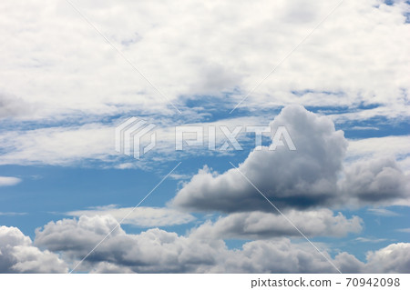 The vast blue sky background and white clouds 70942098