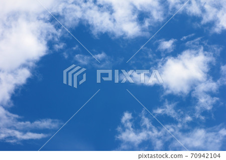 blue sky background and white clouds soft focus 70942104