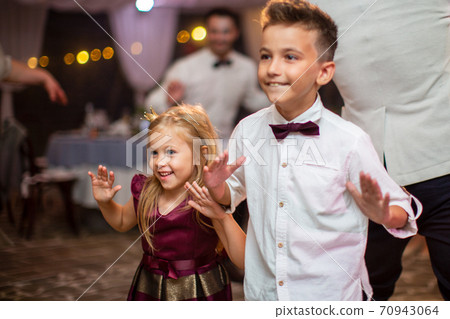 Animators at children's party. Baby disco. Selective focus Animators at children's party. Baby disco. Selective focus 70943064