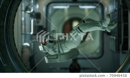 astronaut inside the orbital space station 70946438