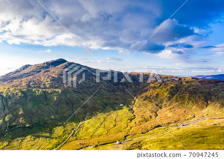 Aerial view of the bluestack mountains viewing towards Carnaween in Donegal - Ireland Aerial view of the bluestack mountains viewing towards Carnaween in Donegal - Ireland 70947245