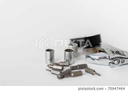 adjustable spanner and other tools on a white background 70947464