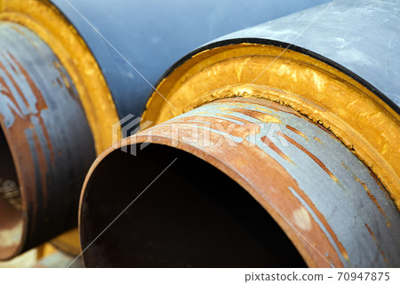 The pipeline is rusty and insulated The pipeline is rusty and insulated 70947875