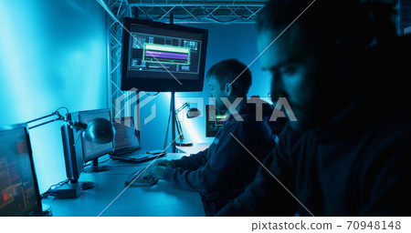 Hackers controlling hostile attack while working in hideout base Hackers controlling hostile attack while working in hideout base 70948148