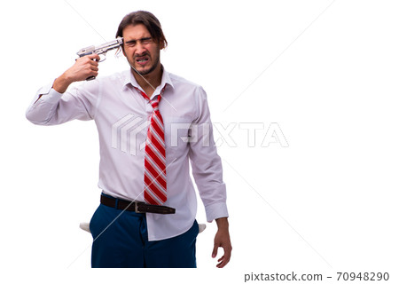 Despaired young male employee holding handgun Despaired young male employee holding handgun 70948290