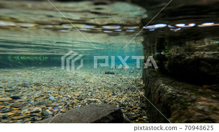Clear stream underwater photography 70948625
