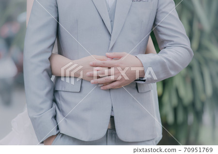 Bride and Groom Married embraced as a symbol of love 70951769