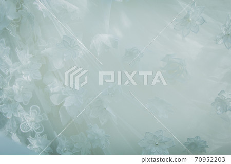 Details of the bride dress fabric and beautiful embroidery wedding concept used as a background for illustrations 70952203
