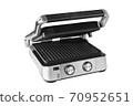 Electric grill for home cooking, burger, vegetables, meat, fish, seafood. Isolated on a white background 70952651