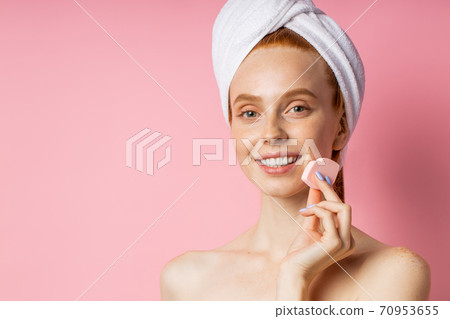 Portrait of lovely lady with naked shoulders isolated on pink background 70953655