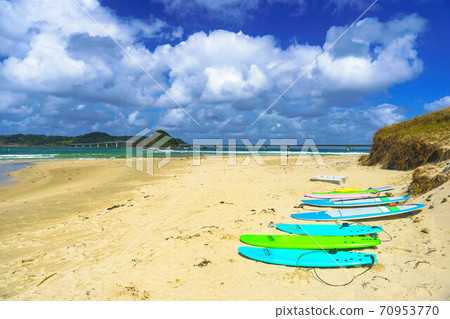 Coast with surfboard Coast with surfboard 70953770