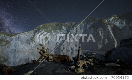 hyperlapse of night starry sky with mountain and ocean beach in Lofoten Norway 70954173