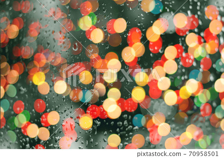 Rain drop on window glass. Road light bokeh colorful.  70958501