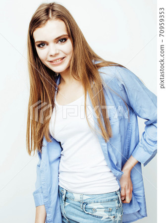young pretty stylish hipster blond girl posing emotional isolated on white background happy smiling cool smile, lifestyle people concept 70959353