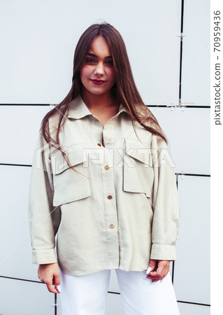 young pretty teenage girl posing cheerful happy smiling wearing street style outside in europe city, lifestyle people concept young pretty teenage girl posing cheerful happy smiling wearing street style outside in europe city, lifestyle people concept 70959436