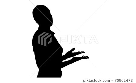 Silhouette Attractive businesswoman walking and talking to the c Silhouette Attractive businesswoman walking and talking to the c 70961478