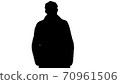 Silhouette Smiling man in coat is looking at camera and walking. 70961506