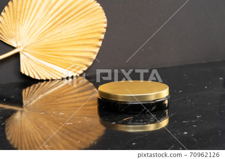 black and gold product display 70962126