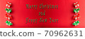 Panorama Christmas gift box with red ribbon and green ribbon on red background with merry christmas and Happy new year text for background 70962631