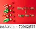 Christmas background, Christmas box with red ribbon and green ribbon, red ball and gold star on red background. Christmas background and Happy New Year for background 70962635
